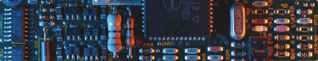 A close up of a circuit board showing all the resistors and connection points